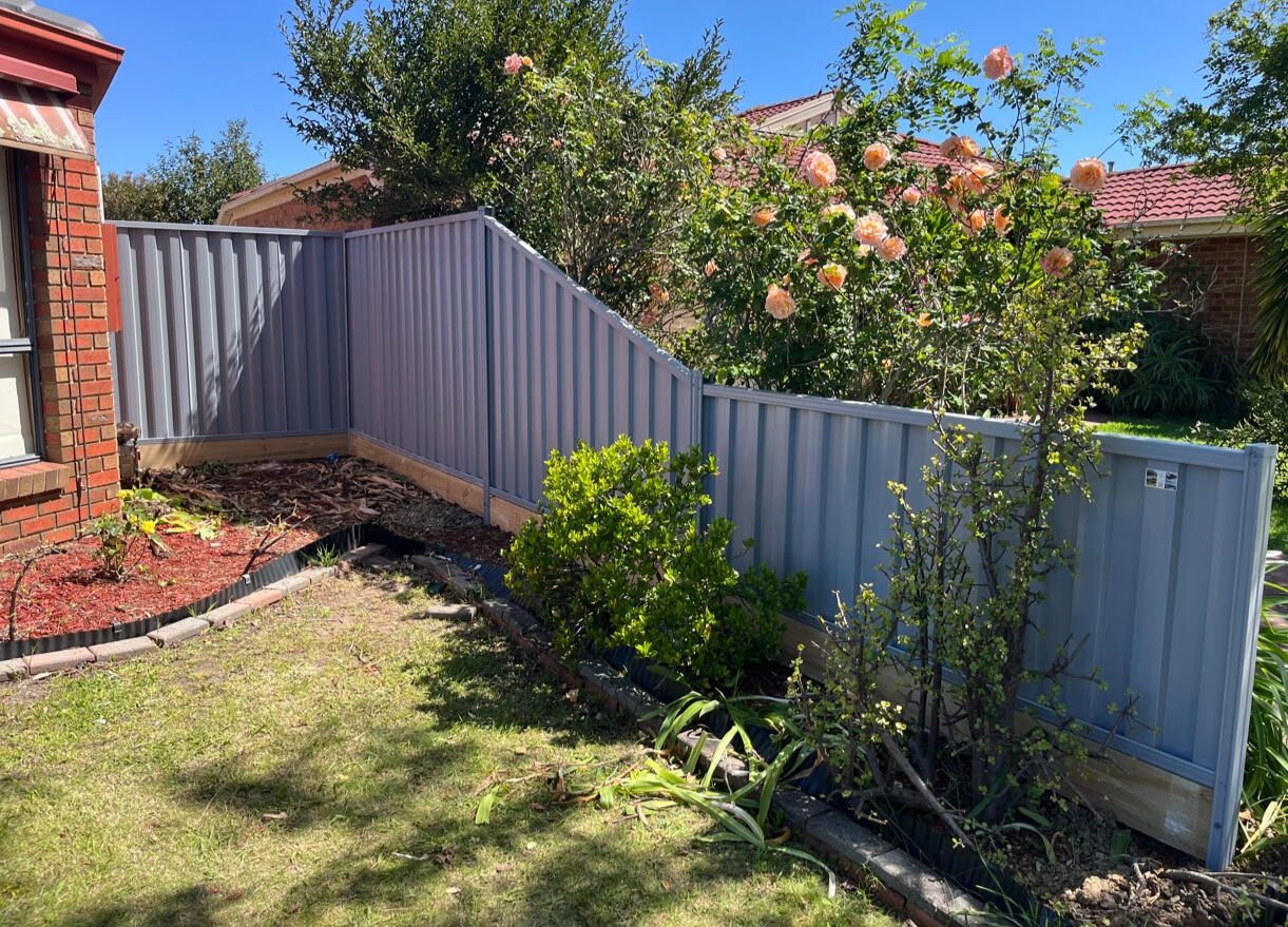 Bluegum Colorbond front boundary fence with aluminium sleepers installed in Narre Warren Melbourne